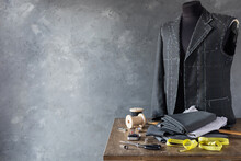 Suit Jacket On Male Tailor Mannequin And Sewing Tools