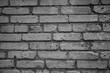 Black and white textured brickwork for background.