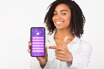Poster - Collage of young black woman controlling appliances and devices, using modern smart home app on cellphone
