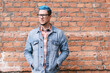 Stylish young man with blue hair.