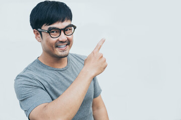 adult asian man.young male wear eye glasses.posing smiling look excited surprised thinking positive happy joy life.empty,copy space for text advertising.white background.attractive fashion people