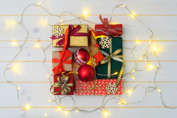 Wall Mural - Christmas presents on wooden table top background