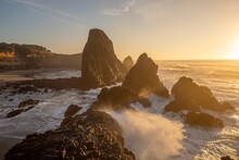 Sunset And Crashing Waves At Seal Rock Park On The Oregon Coast
