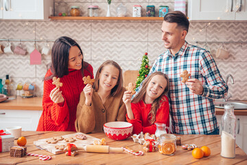 Happy family bake cookies for Christmas