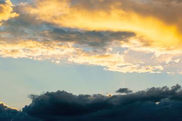 Wall Mural - glowing clouds on evening sky. beautiful nature background