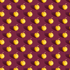 Yellow pumpkin seamless pattern. Made in a flat style on a red background