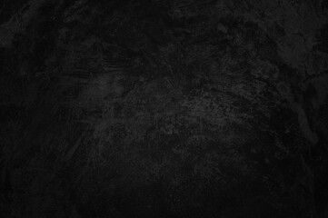 Dark concrete textured wall background.black grunge cement wall texture for interior design. dark edges.copy space for add text.