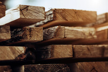 Stack Of New Wooden Studs At The Lumber Yard. Wood Timber Construction Material.
