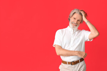 Sticker - Handsome mature man on color background