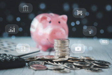 Coins stack and pink piggy with icon business connect on black background, Money spending planning, plant growing up on coins and investment budget, business finance and saving money investment.