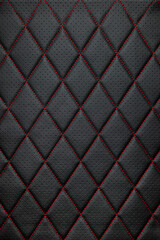  Red stitched black leather texture background.