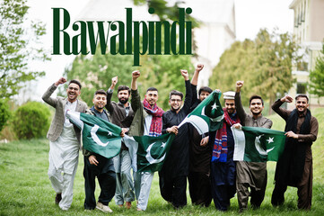 Wall Mural - Rawalpindi city. Group of pakistani man wearing traditional clothes with national flags. Biggest cities of Pakistan concept.