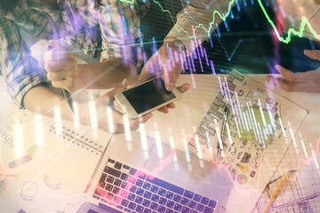 Aufkleber - Double exposure of forex graph drawing and man and woman working together holding and using a mobile device. Trade concept.