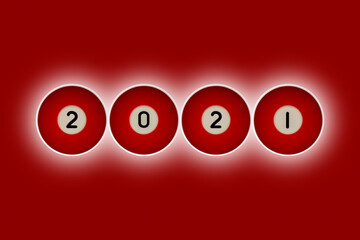 2021 message spelt out with red pool balls with a background glow on a red backdrop