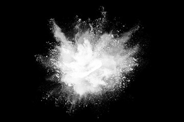 Wall Mural - White powder explosion on black background. Colored cloud. Colorful dust explode. Paint Holi.