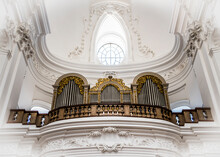 A Musical Organ In A Fabulous White Interior Of A Baroque Church Of Kollegienkirche (Collegiate Church) In Salzburg, Austria