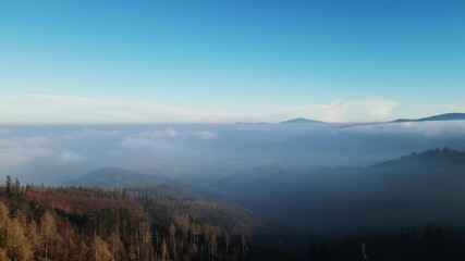 Poster - Aerial footage of Beskidy Mountains with Babia Góra on horizon.