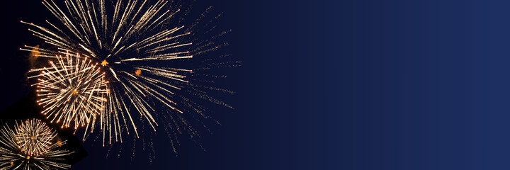 Blue Happy New Year background with golden fireworks