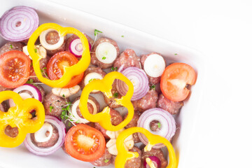 Wall Mural - raw meat balls with vegetables and microgreens isolated on white