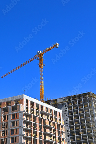 Fotografie, Obraz Crane and highrise construction site