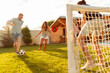 © Impact Photography - Business team on team building football competition