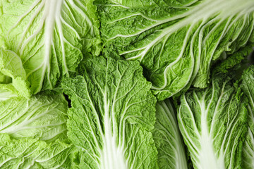 Fresh ripe Chinese cabbages as background, top view