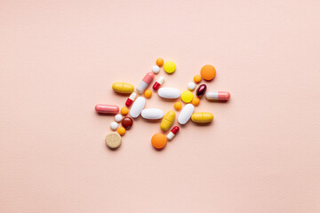 Wall Mural - assorted medical pills hashtag symbol isolated pink background. above view. medicine social media sharing tag