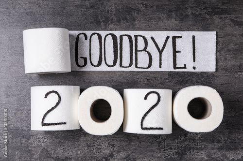Text Goodbye 2020 made with toilet paper on grey stone background, flat lay Fototapete