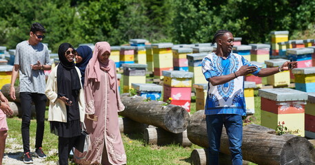 Wall Mural - people group visiting local honey production farm