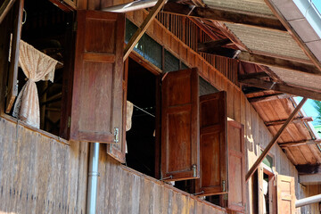 Wall Mural - Detail of Old wooden window ,Thailand traditional style house 