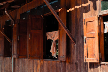 Wall Mural - Detail of Old wooden window ,Thailand traditional style house 