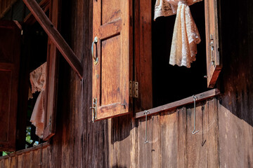 Wall Mural - Detail of Old wooden window ,Thailand traditional style house 