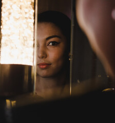 Sticker - Portrait of beautiful young woman  near mirror