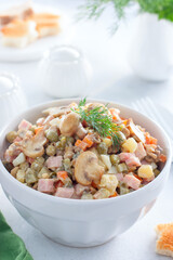 Wall Mural - Olivier with champignons, Russian salad with vegetables and mushrooms, selective focus