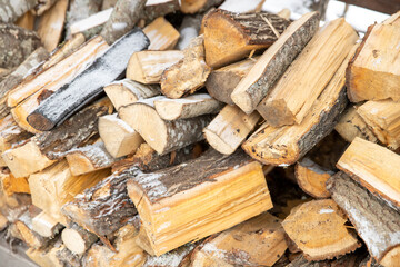 Poster - wood in a heap with snow in winter