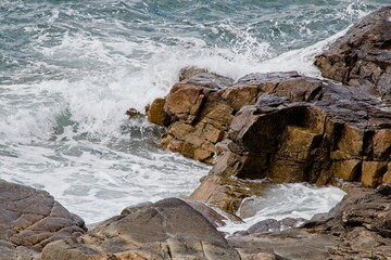 waves crashing on rocks