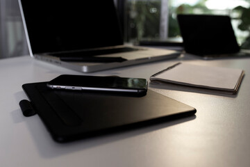 laptop and pen