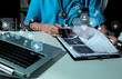 © SOMKID - Medical technology and futuristic concept. Doctor hologram modern virtual screen interface.
