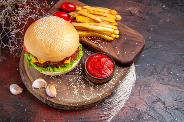 Wall Mural - front view tasty meat burger with french fries on a dark background meal bun sandwich