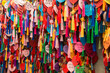 © Milou Dirks - Collection of ritual of hanging colorful written wishes on together in asia and china