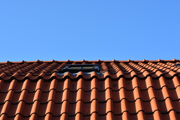 roof of the house with red tile