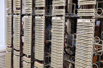 Telecommunication tag block racks in main distribution frame room