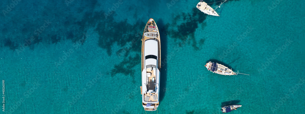 Aerial drone ultra wide top down photo of luxury yacht anchored in ...