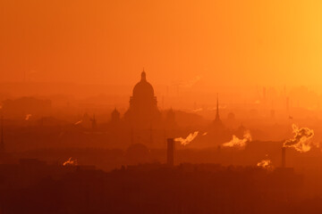 Wall Mural - Aerial panoramic view of Saint-Petersburg, Russia, with St. Isaac's cathedral, the Winter Palace and Admiralty, with beautiful vibrant red orange sunset sundown, dusk cityscape silhouette scenery