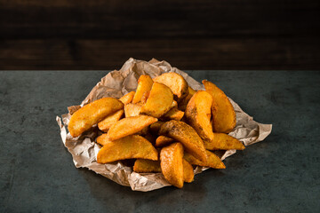 Sticker - Potatoes fries on kraft paper on table, French fries close up