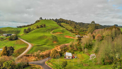 Canvas Print - Waitomo countryside and hills in spring season, aerial view of New Zealand