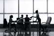 © Pixel-Shot - Silhouettes of businesswomen working in office