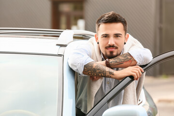 Poster - Handsome man in modern car