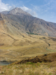 Wall Mural - Beautiful view of Panj river valley border between Tajikistan and Afghanistan in Darvaz district, Gorno-Badakshan, Pamir mountain region of Tajikistan