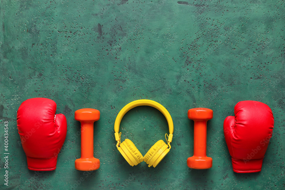 Set of sport equipment on color background